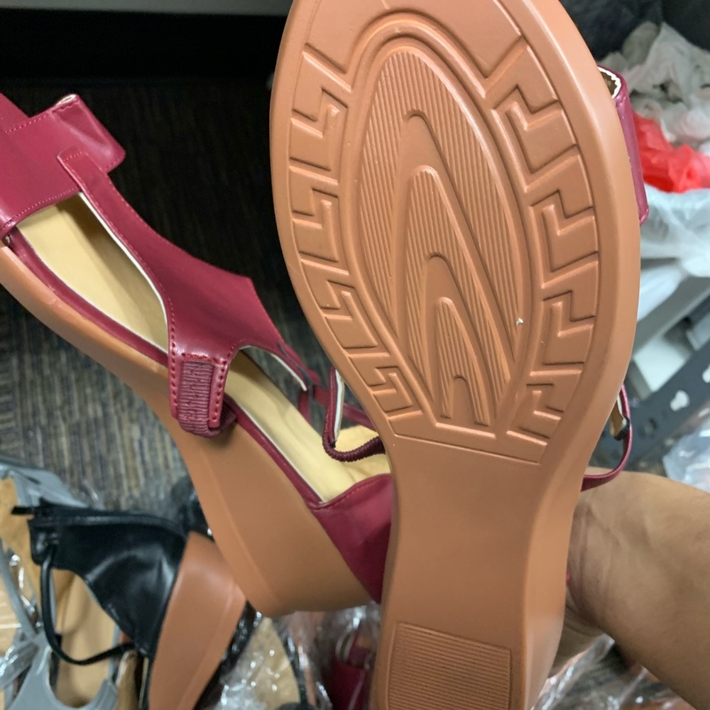I’m selling 8 pairs of wedge heel sandals